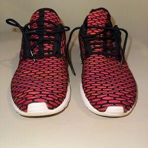 The Nike Flyknit Rosherun sneaker “fireberry”